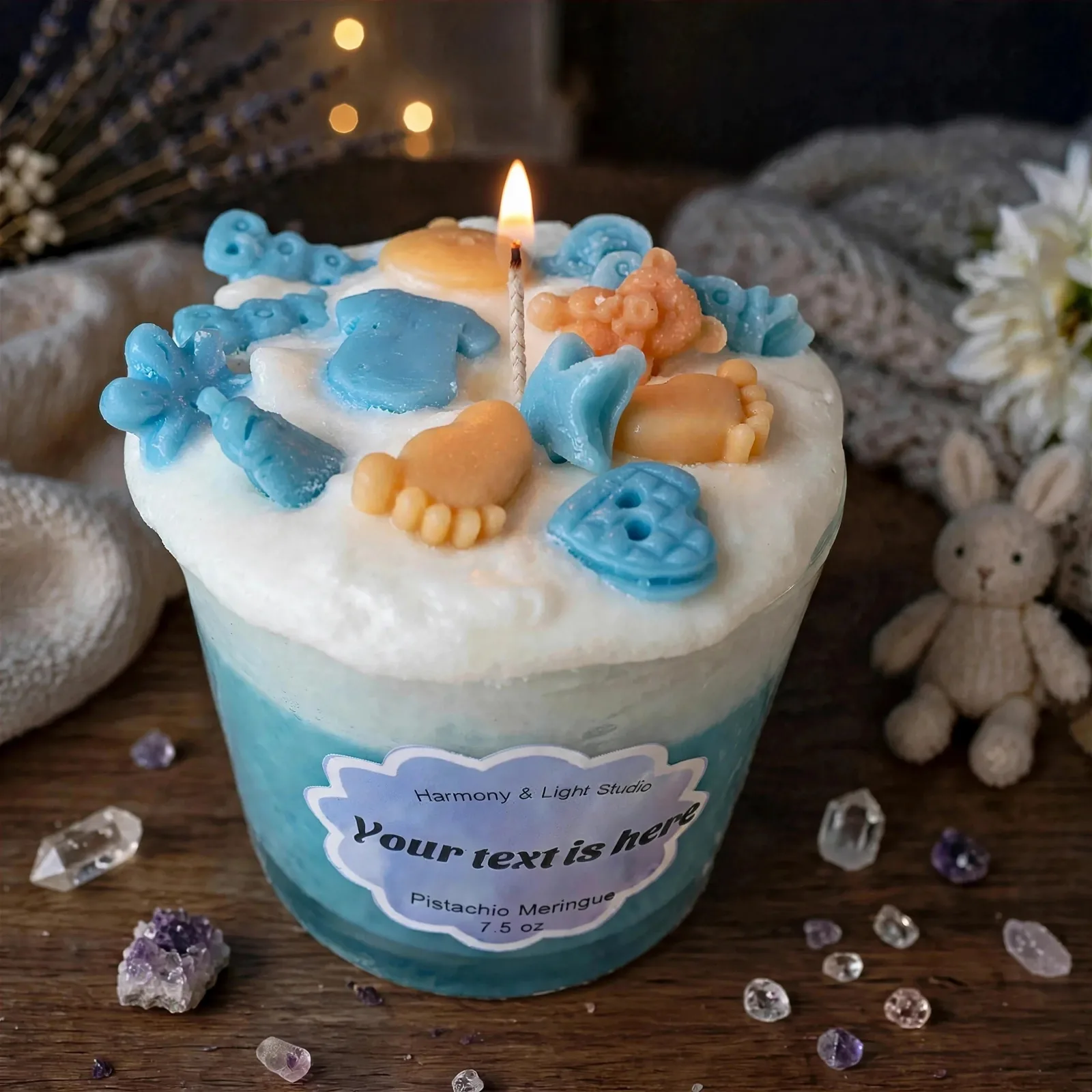 Custom Baby Shower Candle: Pistachio Meringue Scent — lit with a warm flame