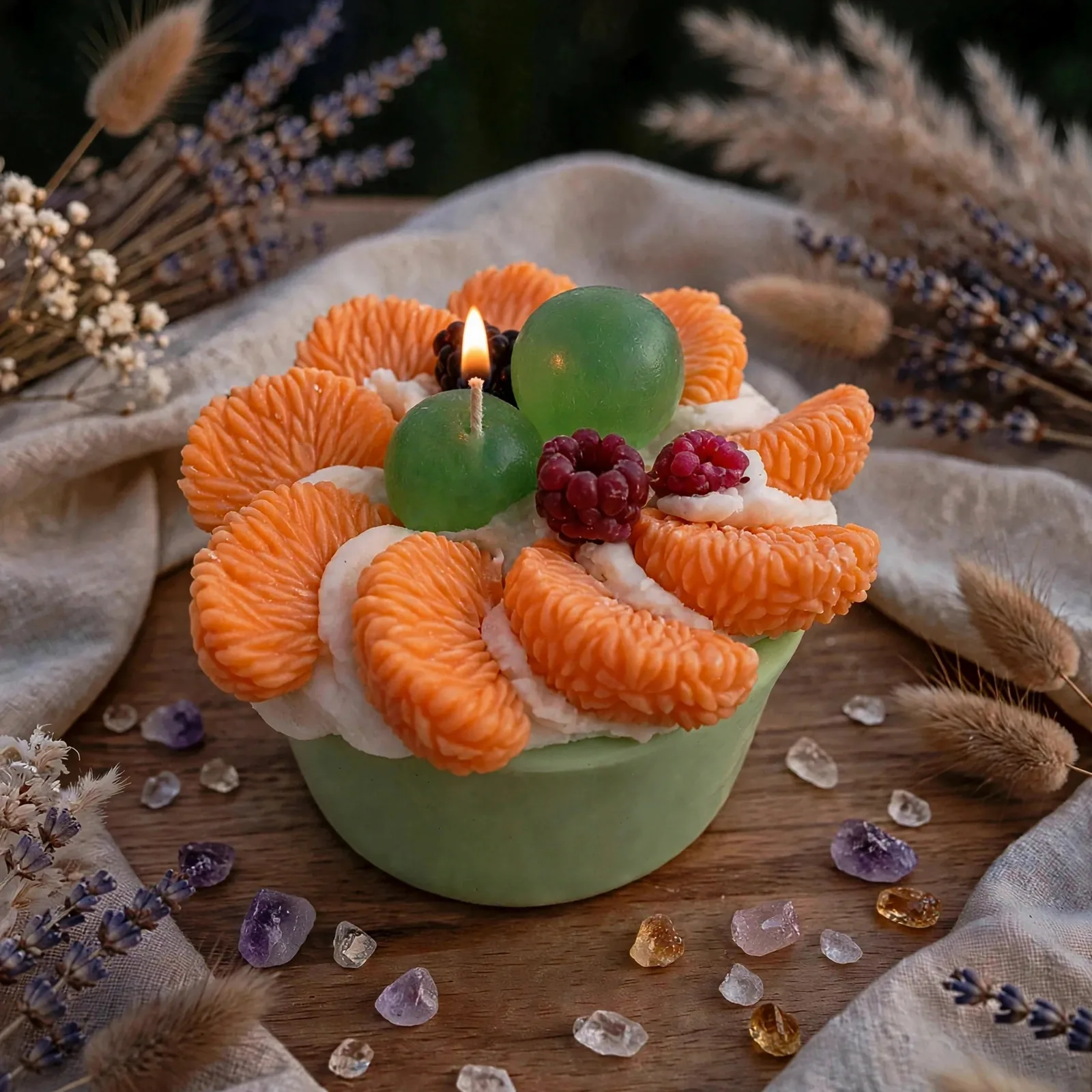 Evergreen Apple Dessert Candle — lit with a warm flame