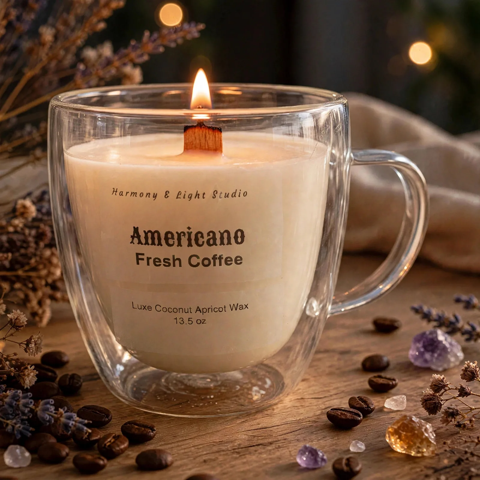 Americano Scented Candle — lit with a warm flame