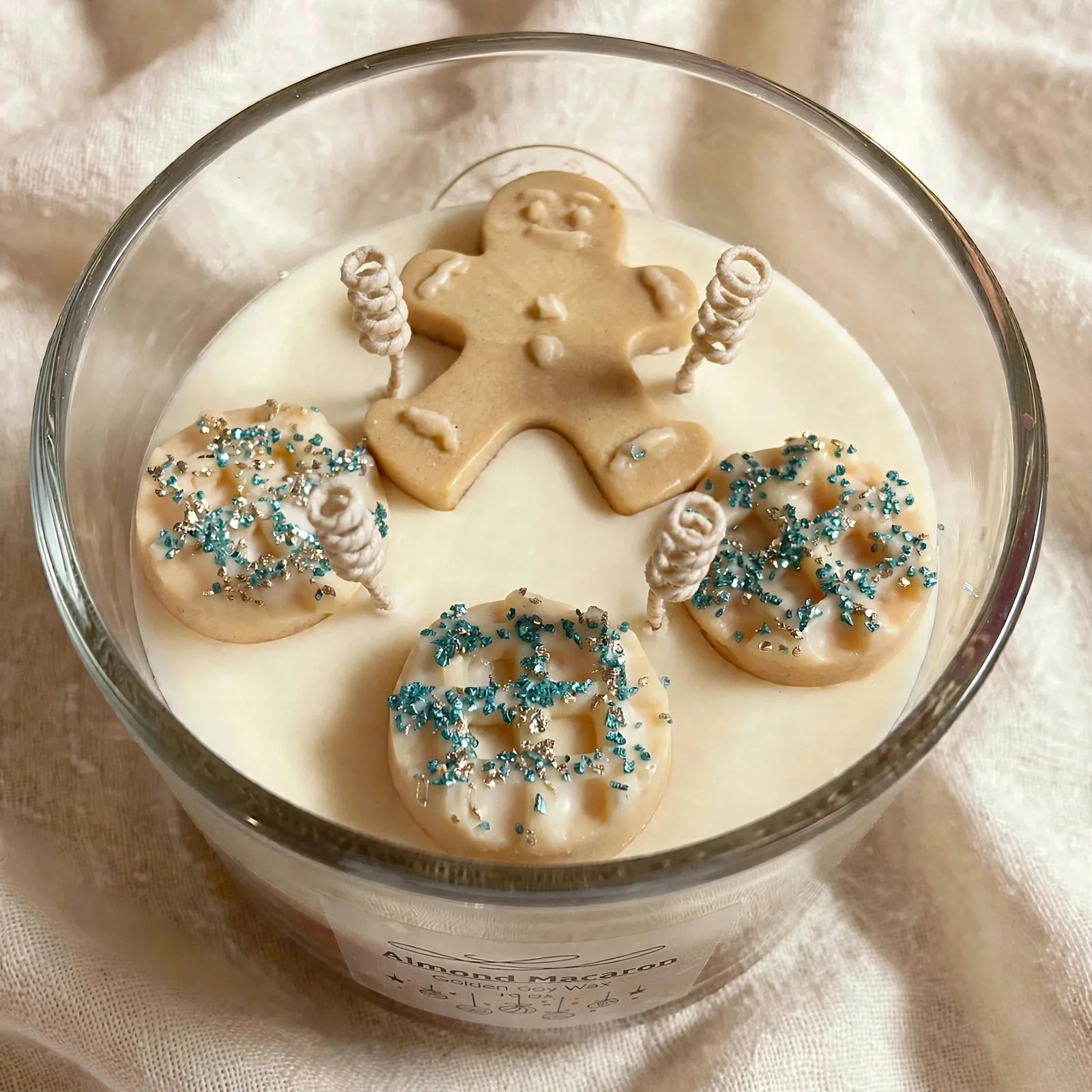 Almond Macaron Soy Candle - Four Wick Holiday Candle — close-up detail