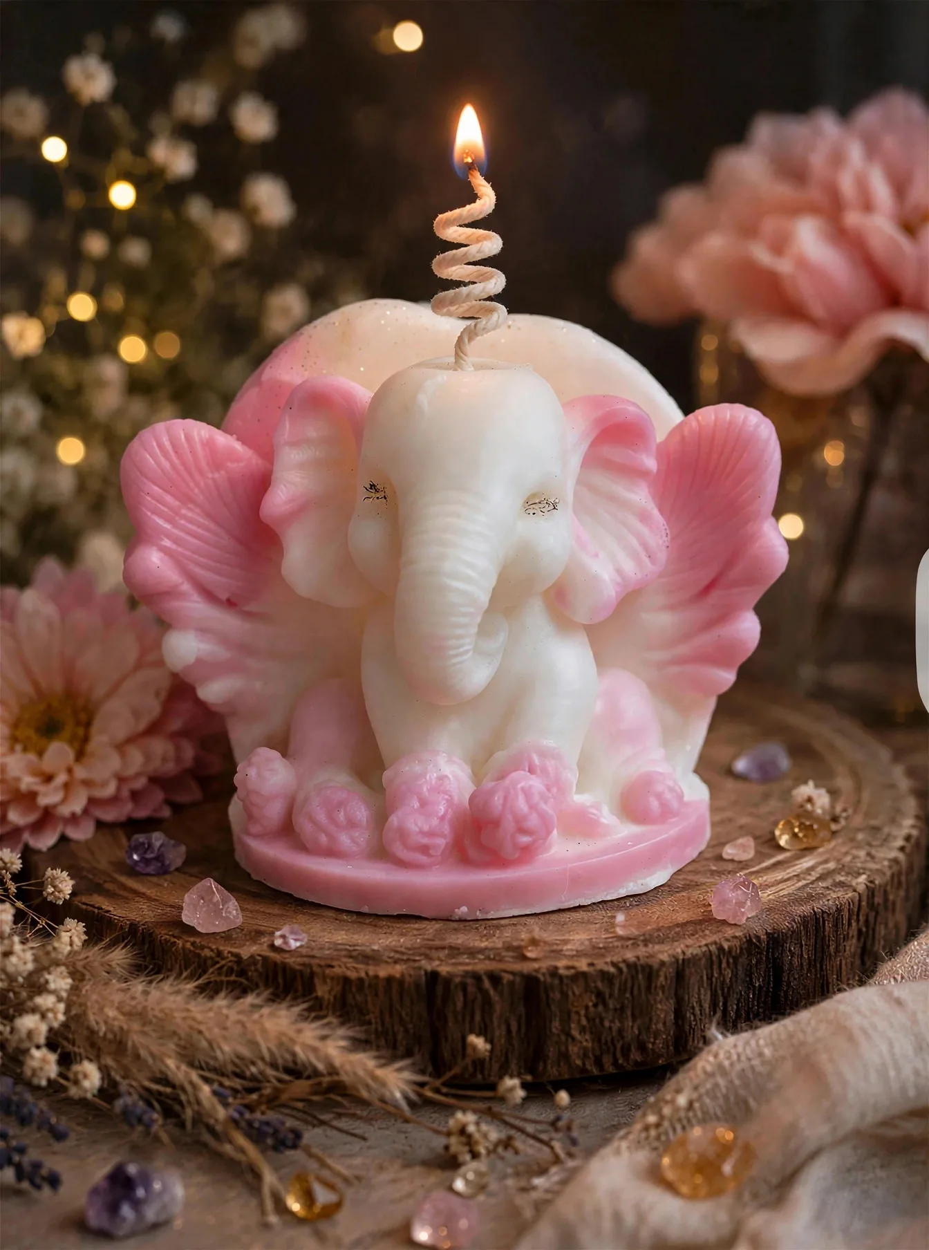 Handmade Ganesha Candle: Peach Blossom Scented — lit with a warm flame